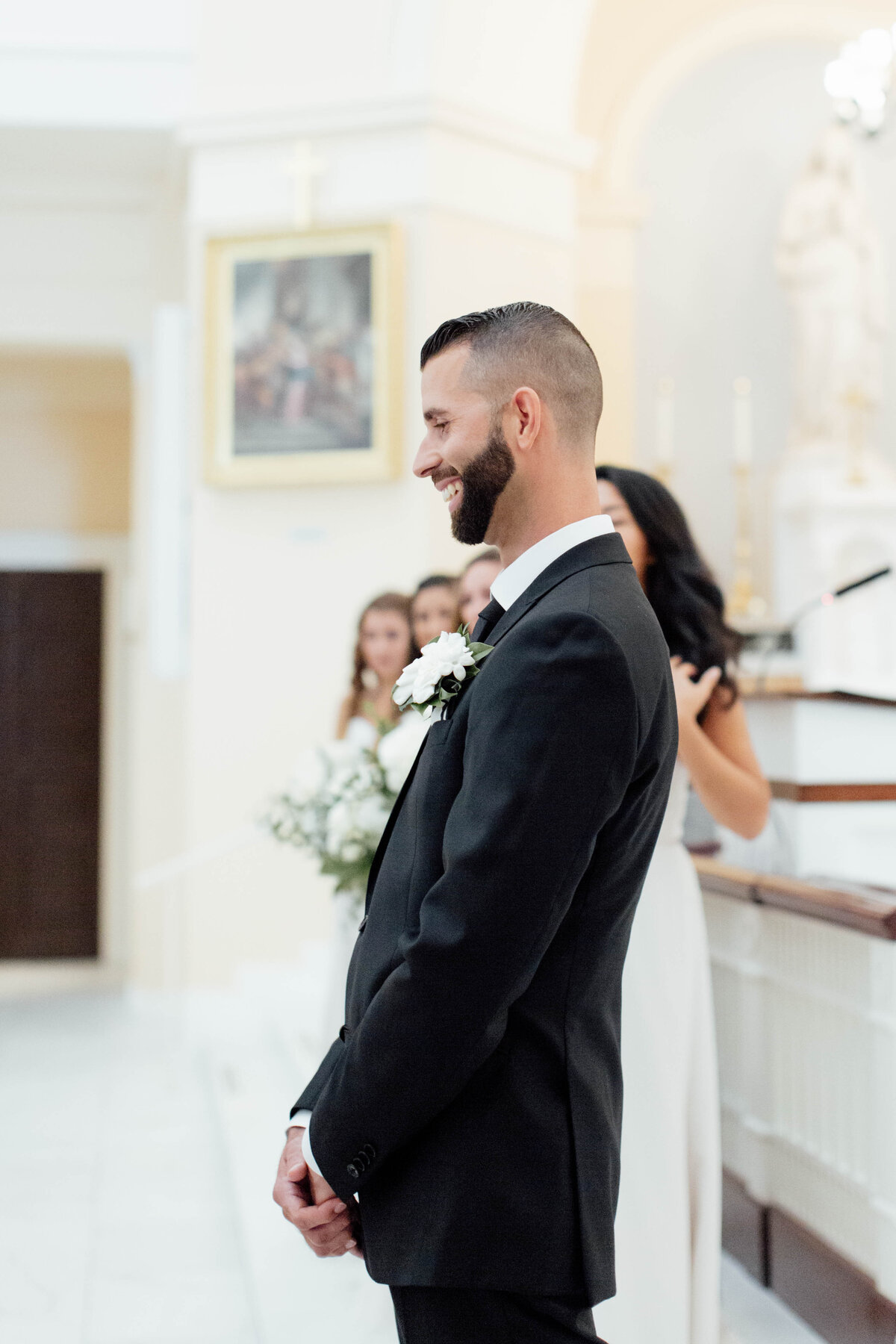 Groom excited to see bride for the first time.