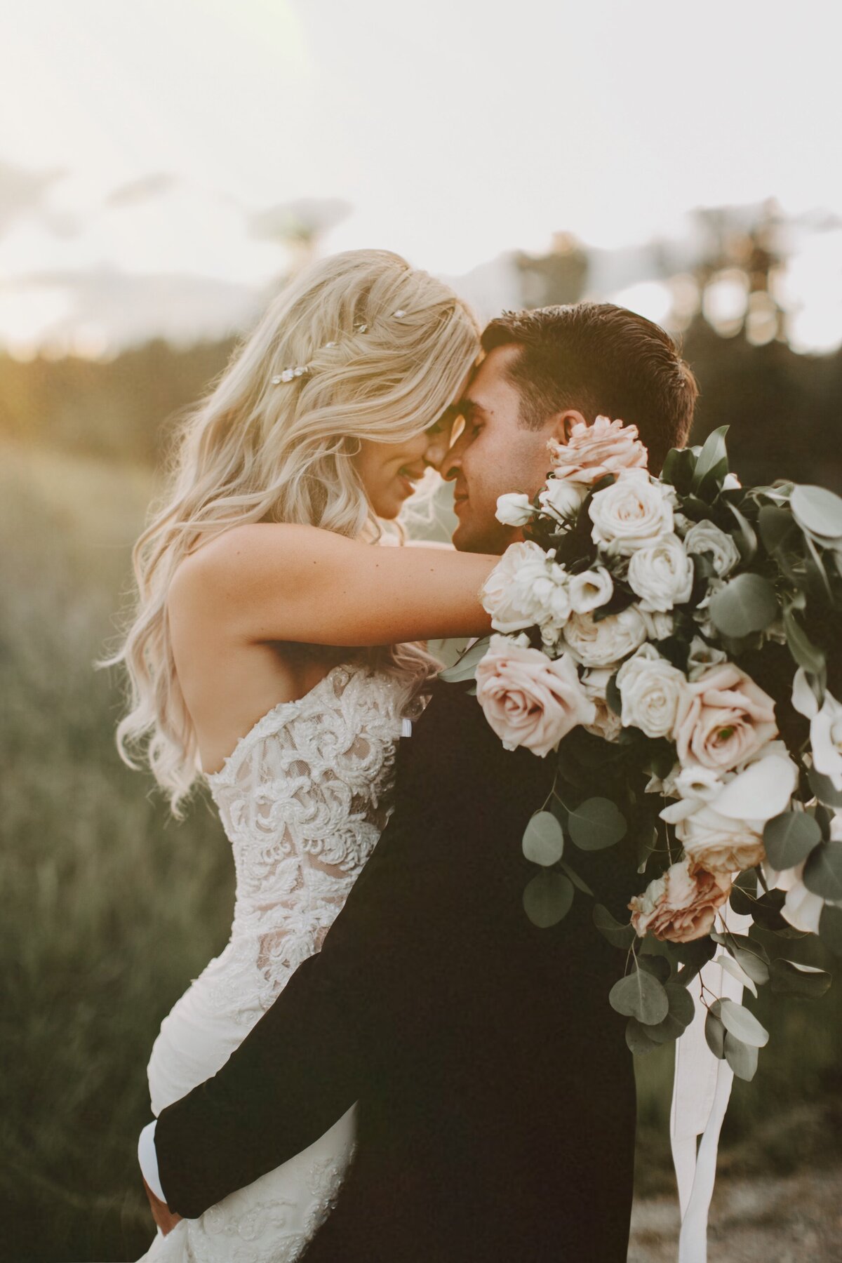 Romantic hair and makeup by Bellamore Beauty, feminine Calgary hair and makeup artist, featured on the Brontë Bride Vendor Guide.