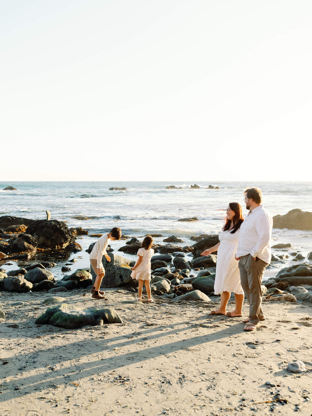 landscape photo of family during fall mini session at laguna beach