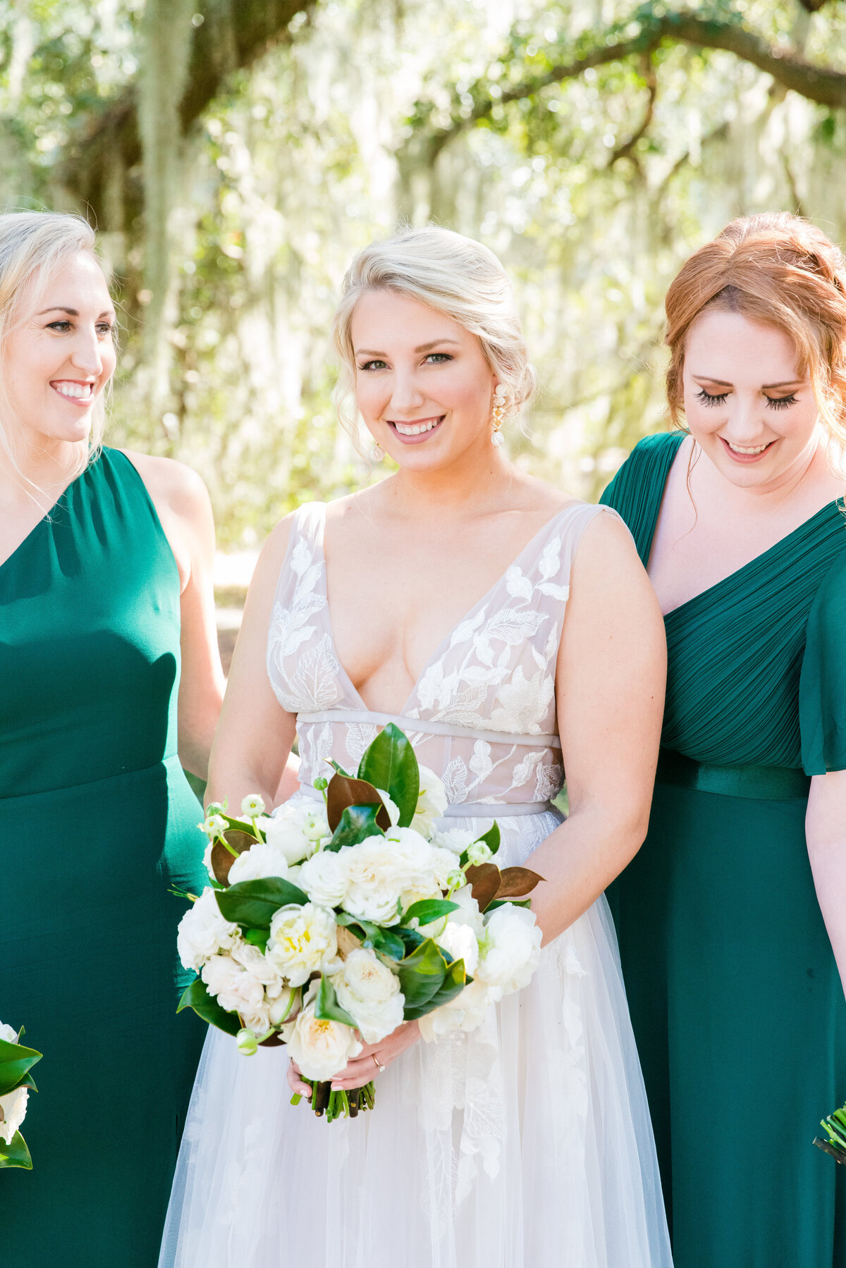 Bride with bridesmaids before her Veuve-inspired wedding at Palmetto Bluff in Charleston, SC. Photographed by Charleston Wedding Photographer Dana Cubbage.