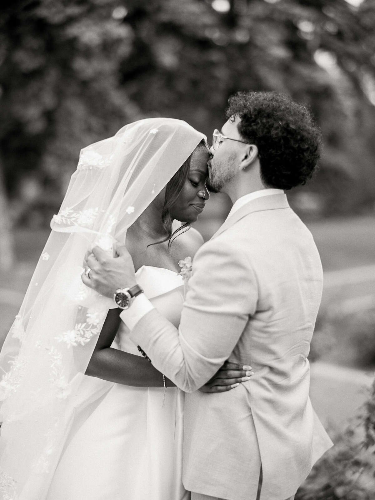 black and white photo of bride and groom