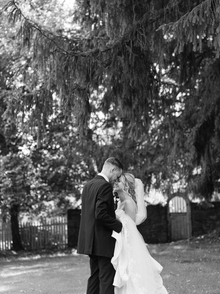 couple sharing an emotional moment taken by one of the top washington dc wedding photographer Nicole Simensky