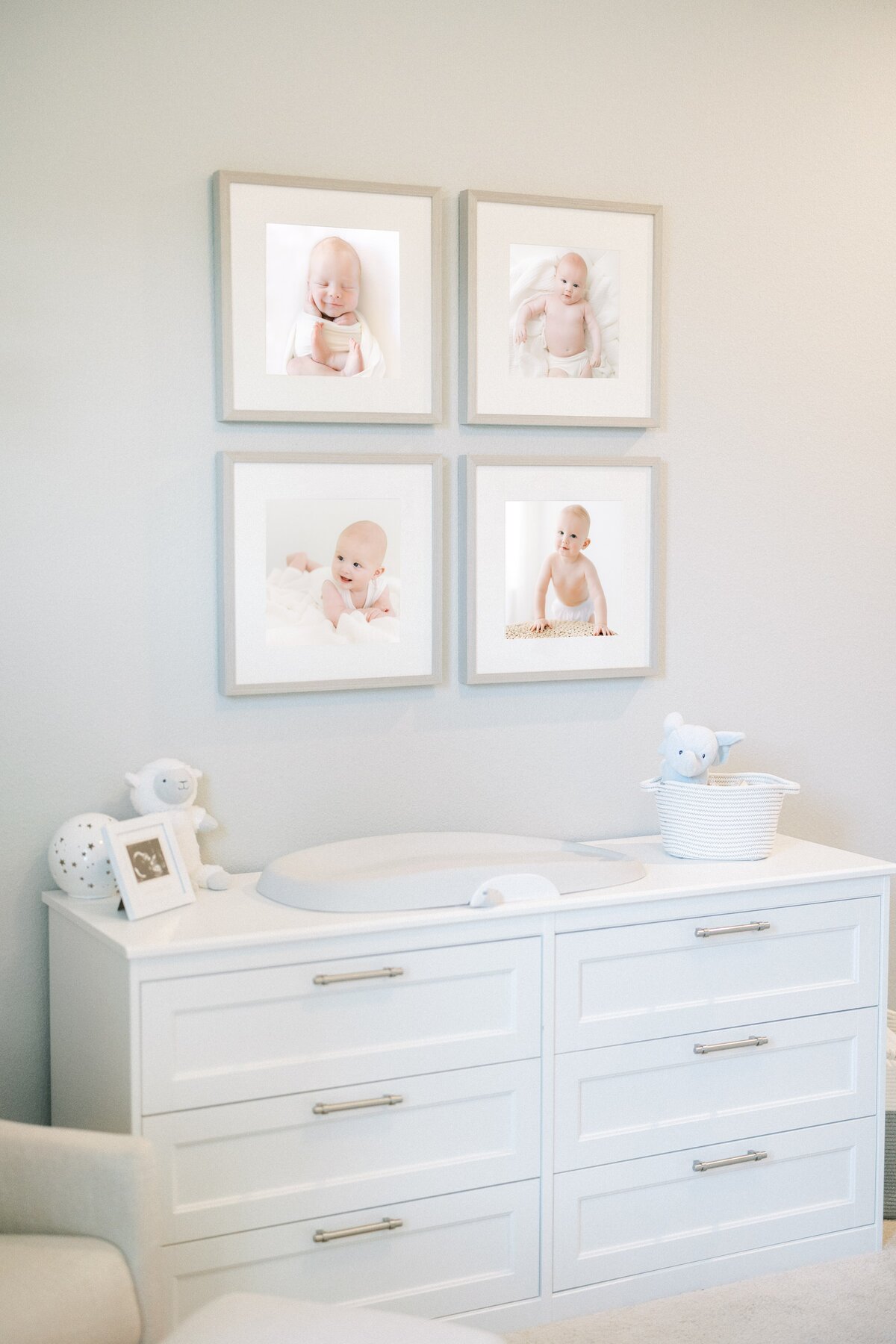 framed wall gallery in baby nursery with image of newborn 3 months 6 months 9 months and one year