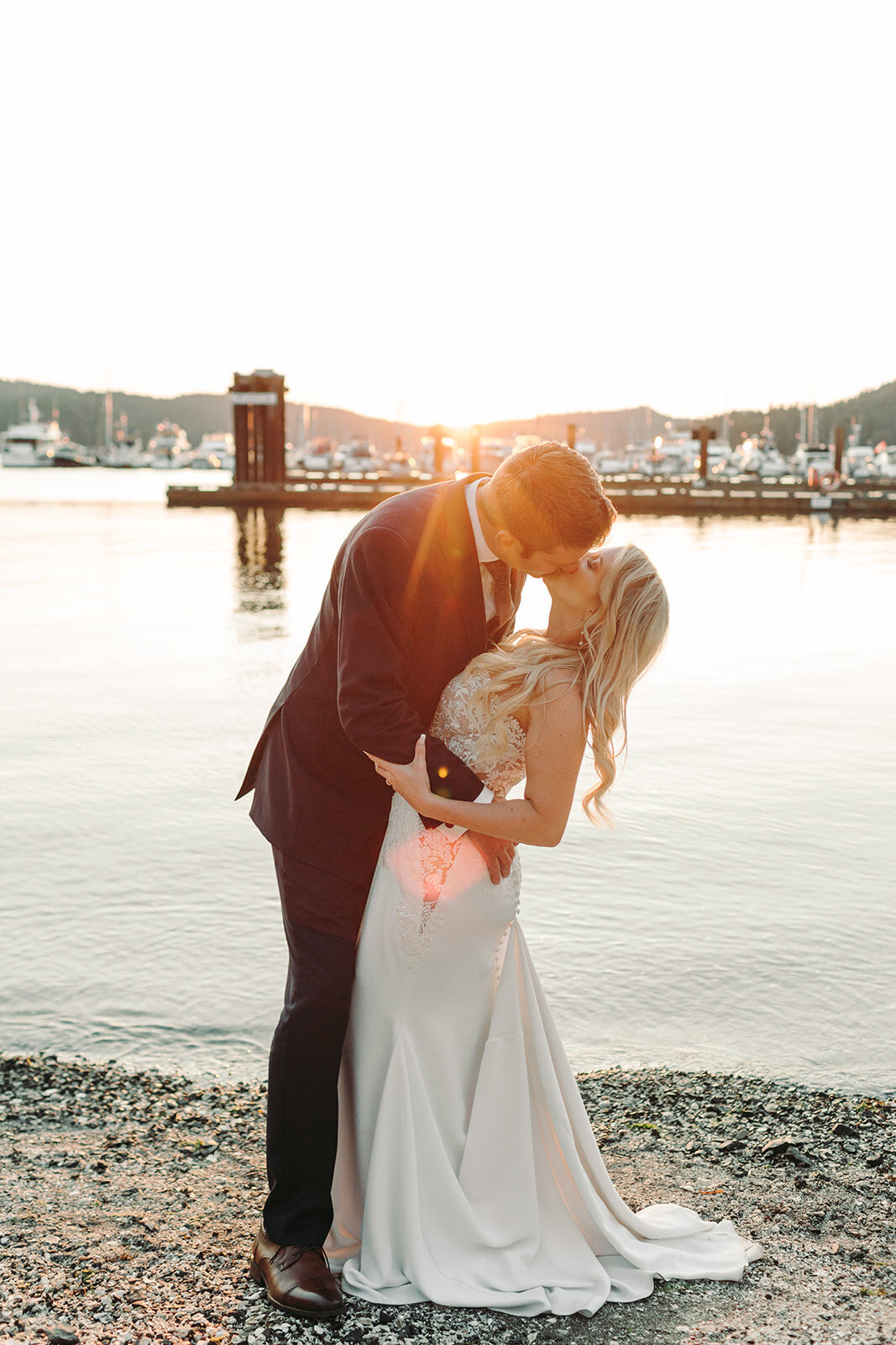 Utah Wedding Photography capturing couple kissing at sunset