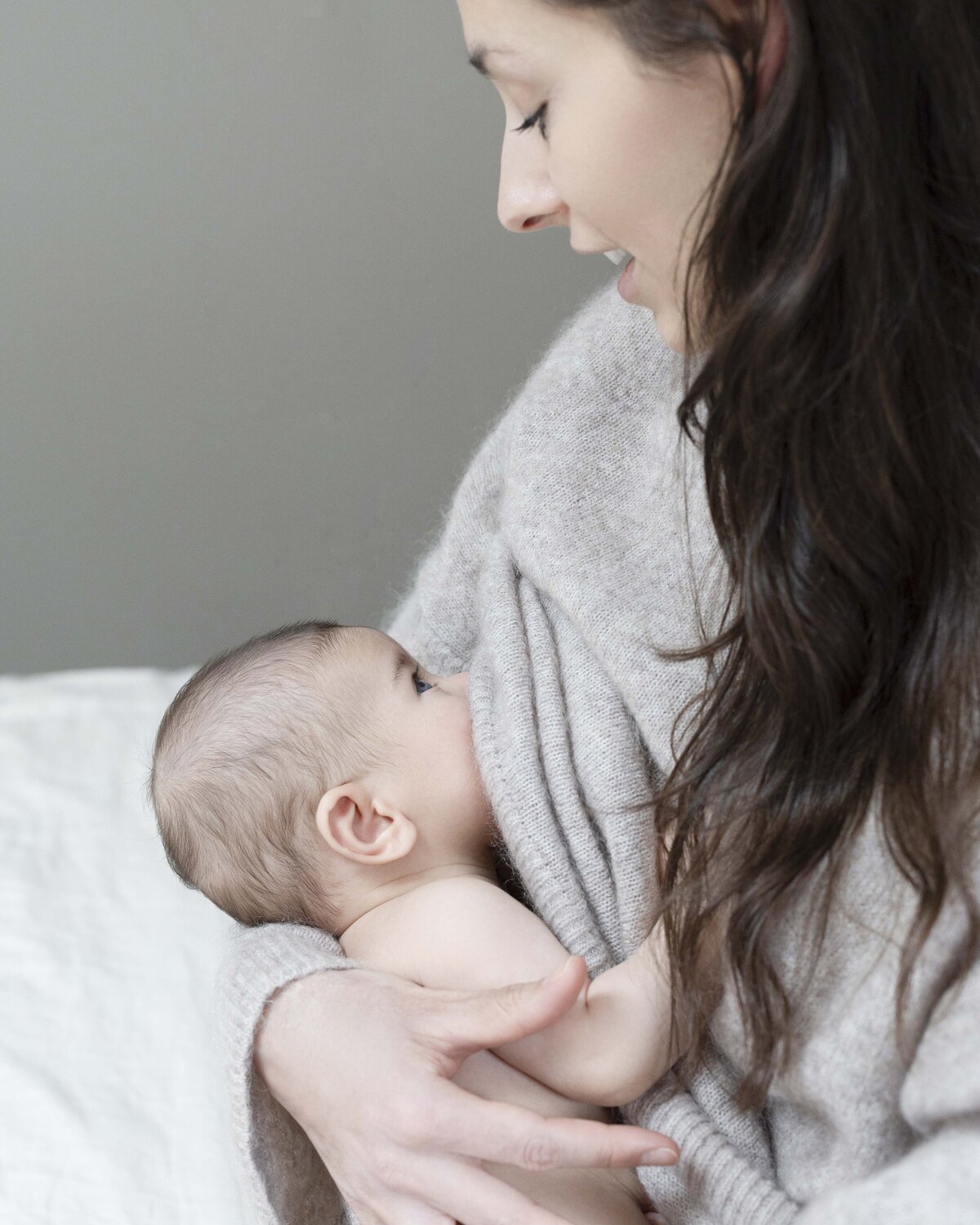 Beautiful portrait of a mother breastfeeding her baby.