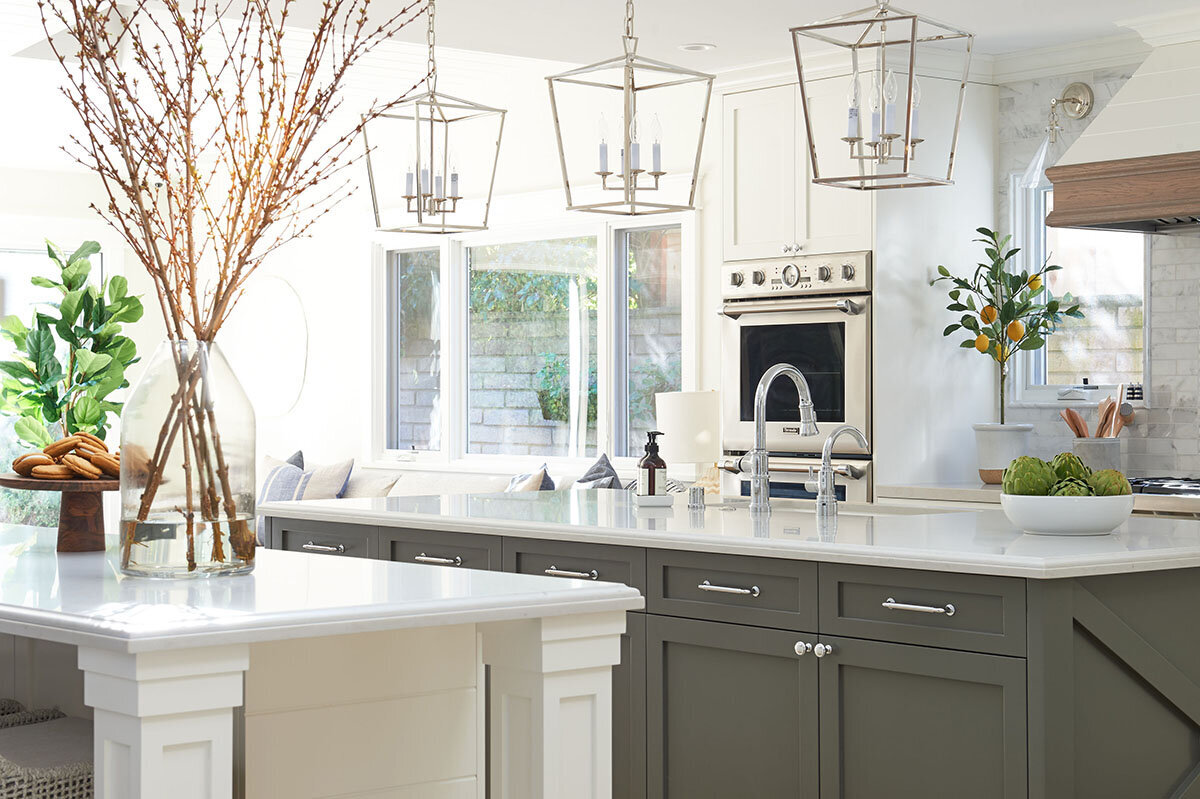 lanter pendants over dark kitchen island