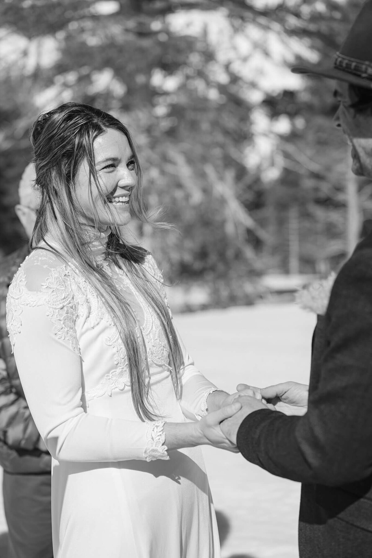 Black and white image of a Bride during an elopement ceremony in winter at Palisades Tahoe
