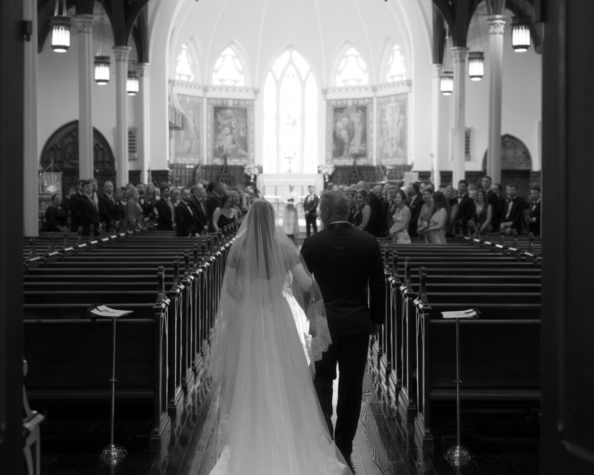 bride-and-father-walking-down-the-aisle-church-wedding