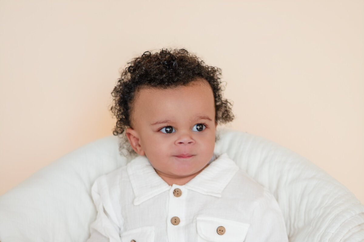 candid-baby-milestone-studio-portrait