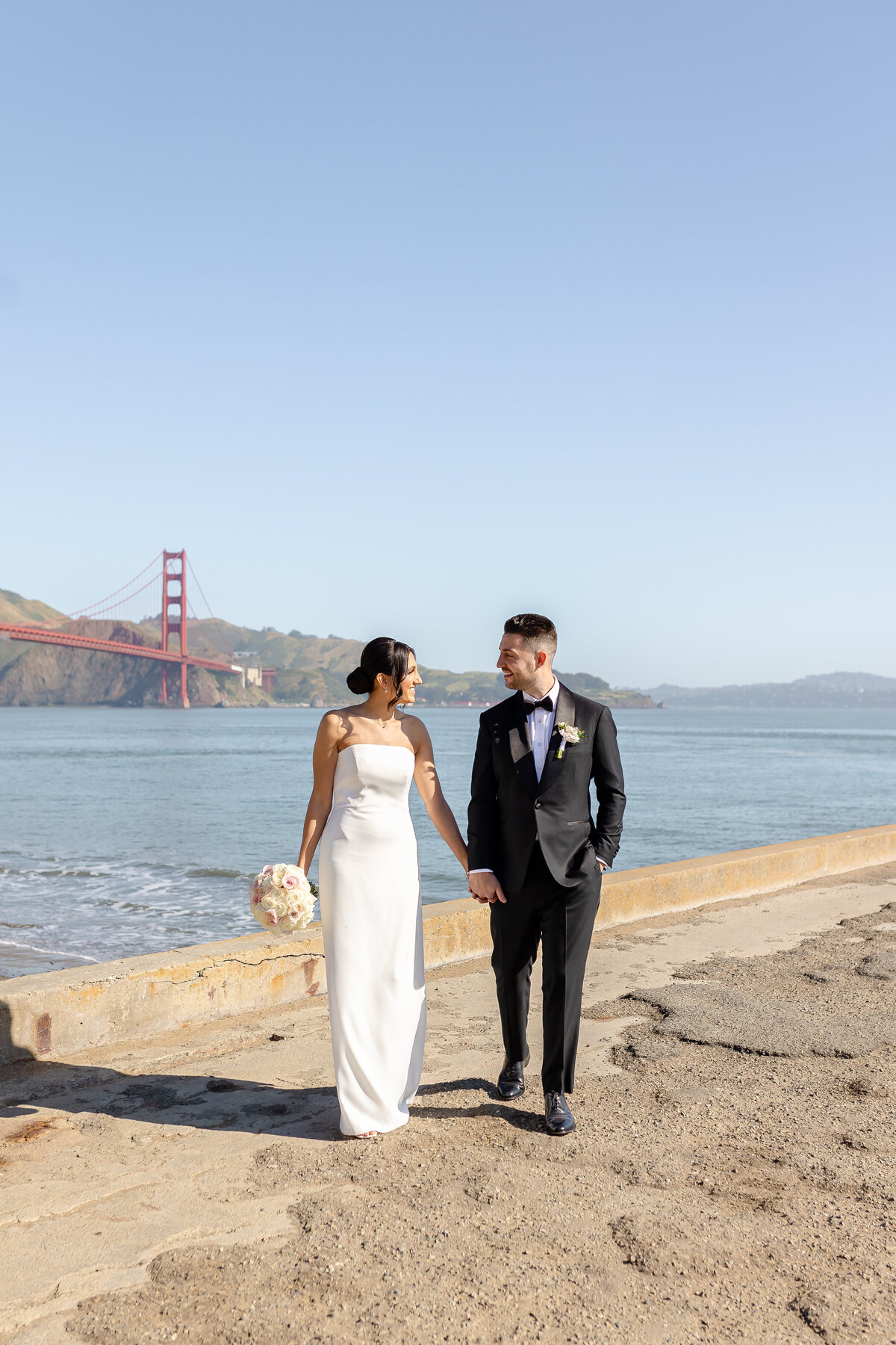 Couples by the bentley golden gate bridge water side 