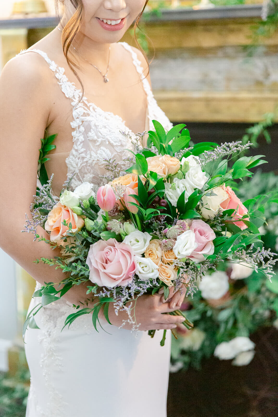 Gorgeous pink and peach bridal bouquet. Captured by Bethany Aubre Photography.