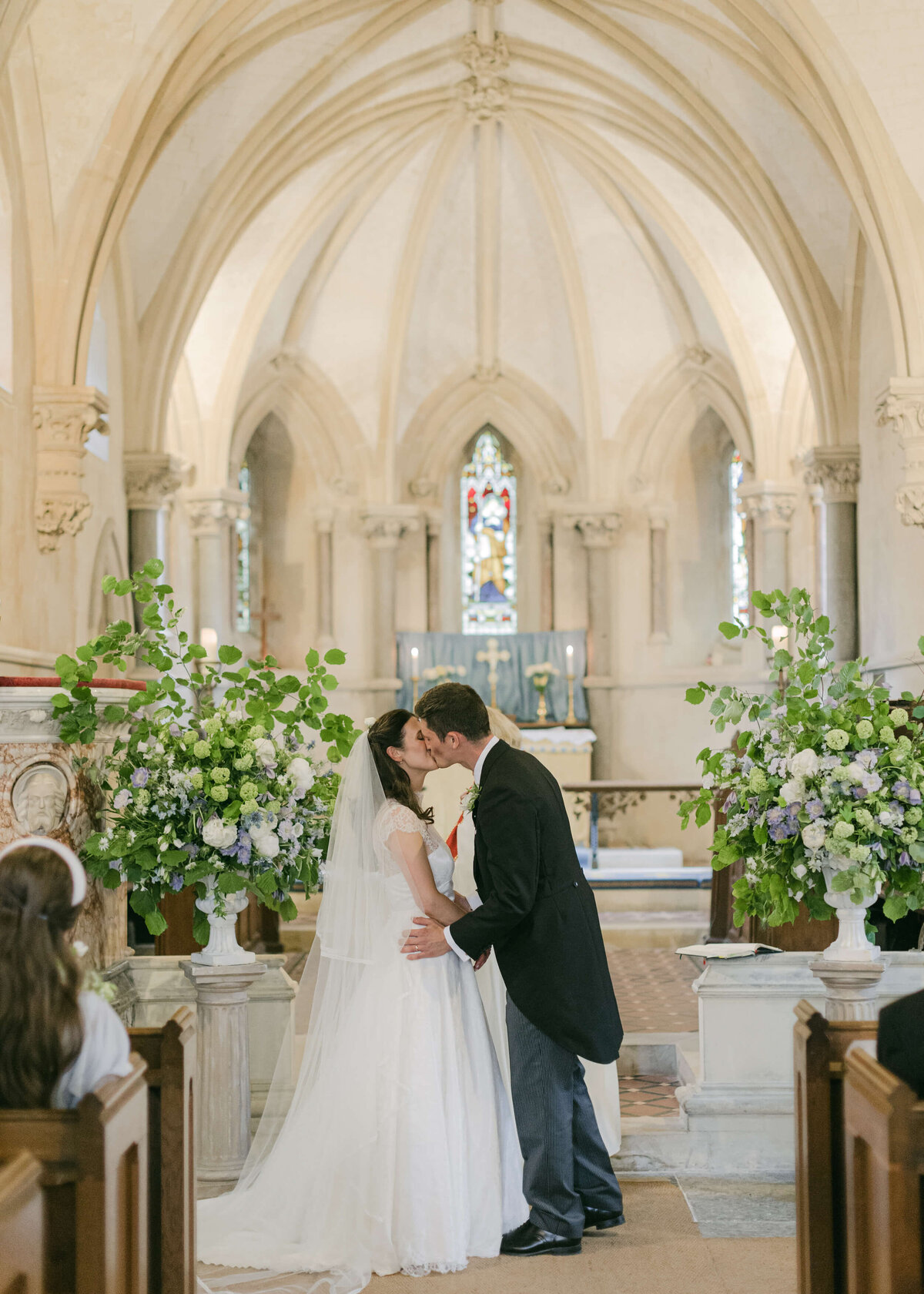 chloe-winstanley-weddings-wiltshire-church-ceremony-first-kiss