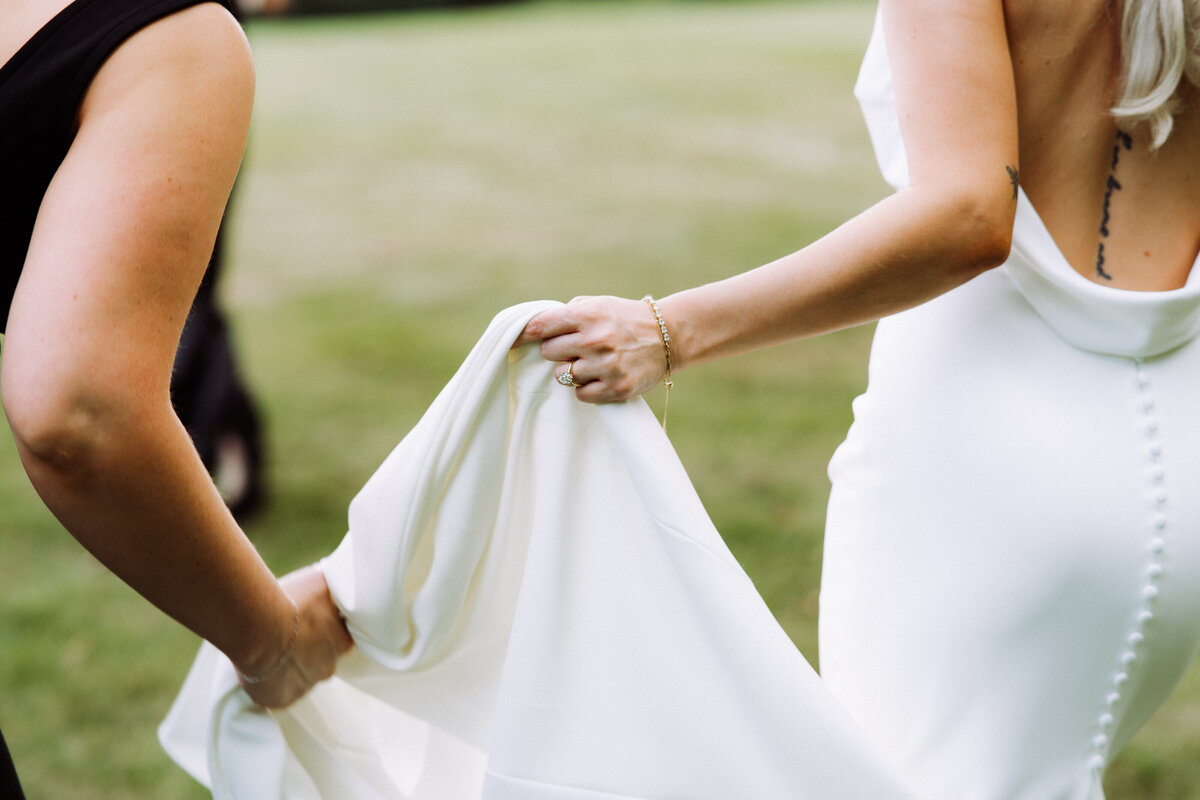 bride carrying her train