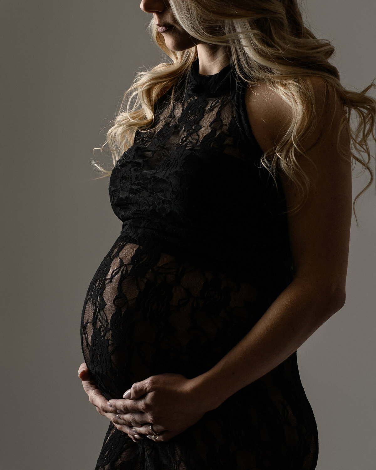 photographer Syracuse, pregnancy photo shoot, mother to be, baby pics, pregnancy gowns, pregnancy photos, photography, baby belly, backdrop, studio, white and black, lace dress, blonde
