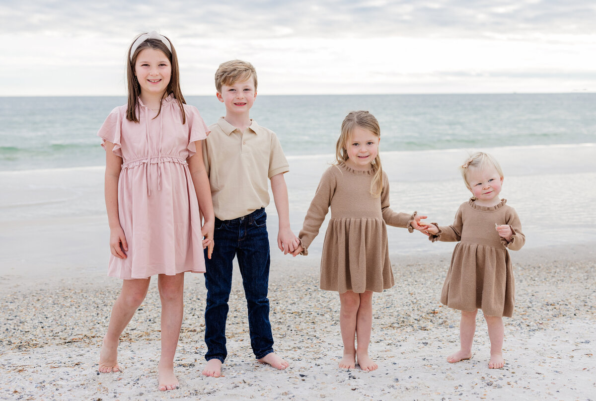 siblings beach portraits in Orange Beach Al