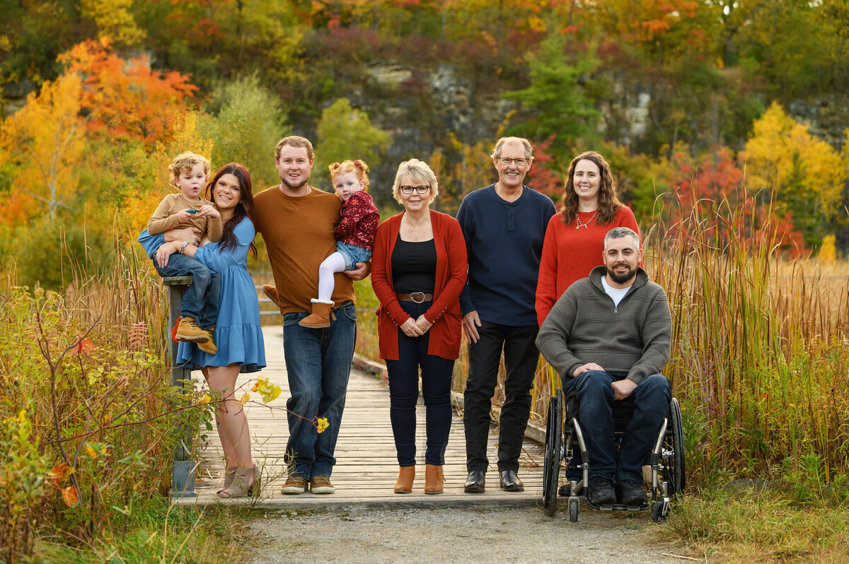 Extended family fall photos in Burlington, On with 8 people, 1 in a wheelchair