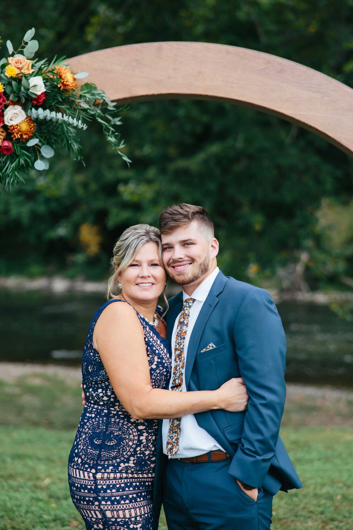 mother and son smiling at hiltons wedding venue