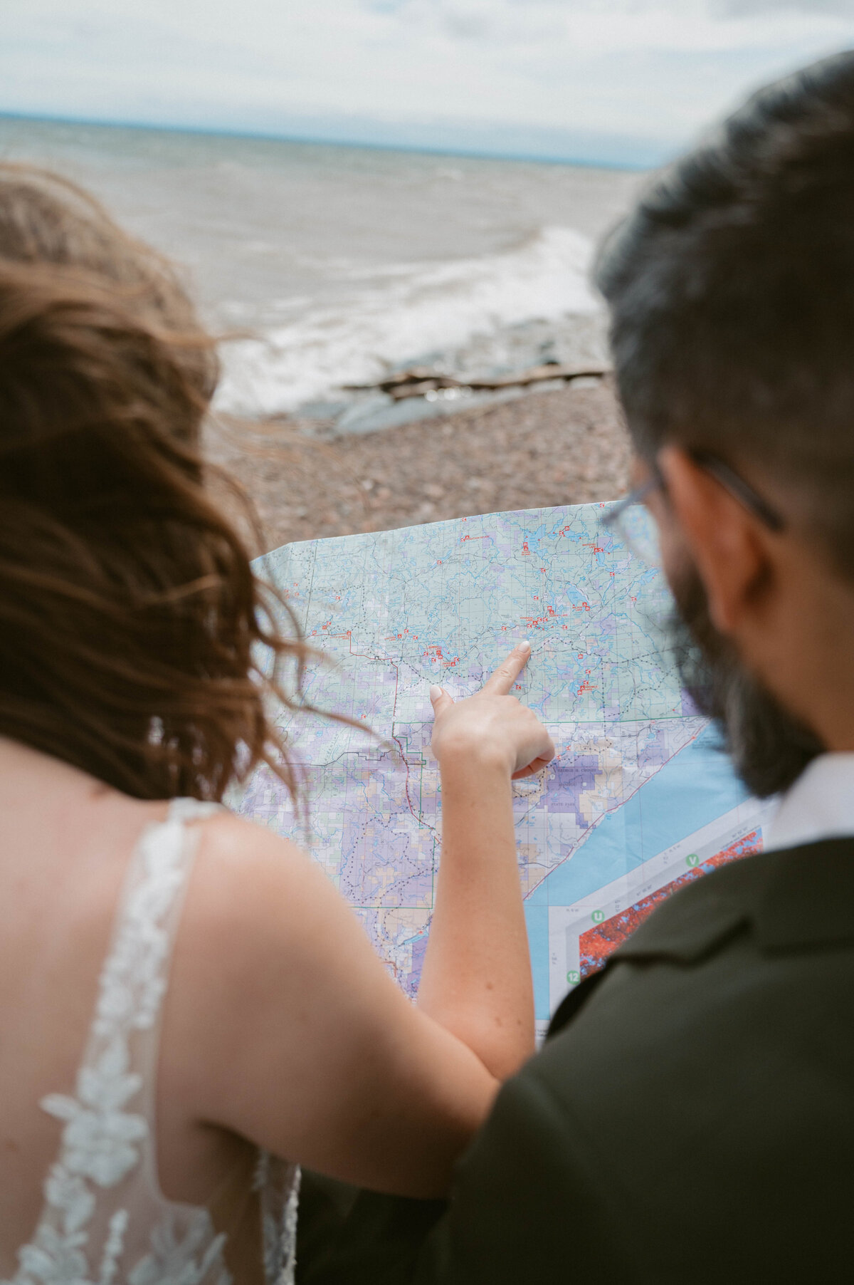 couple explore with map