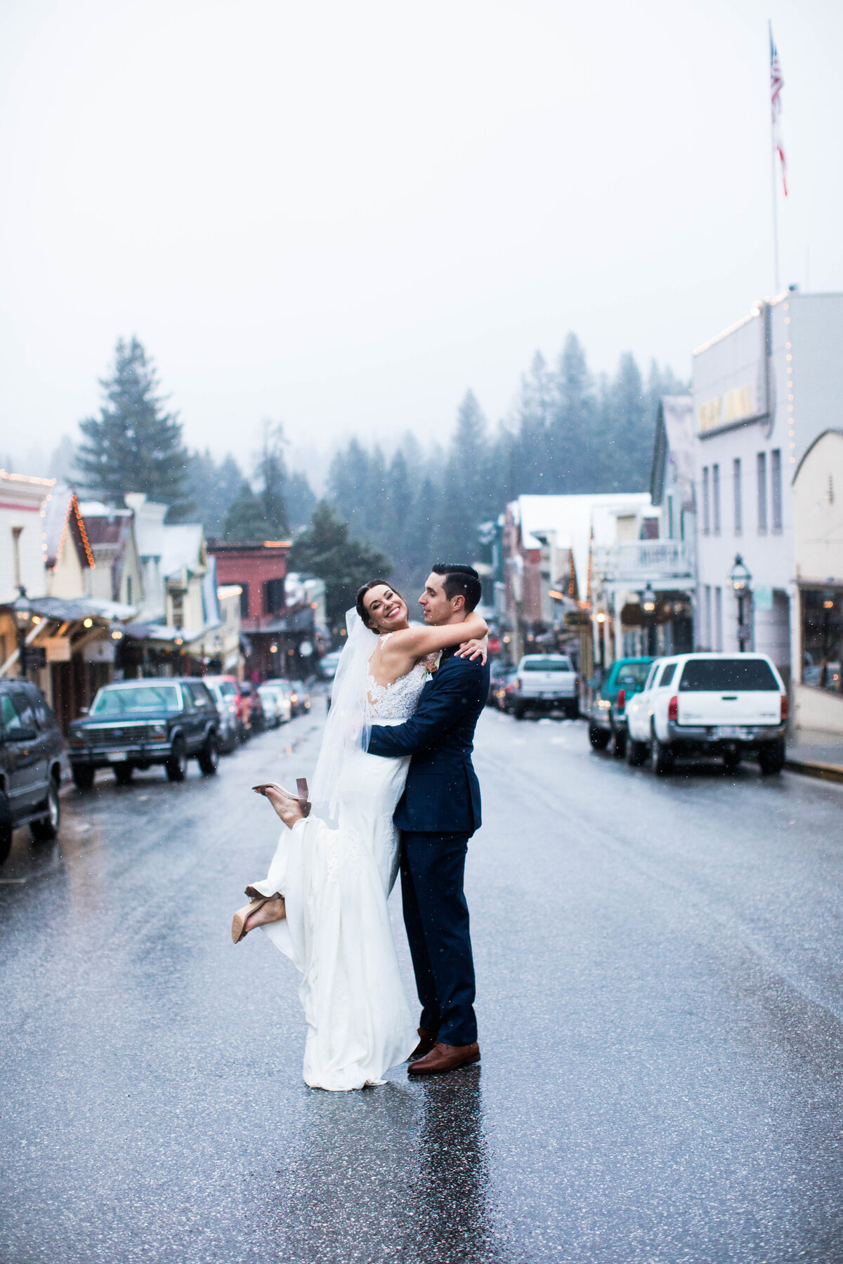 Bride and groom in the center of the street in Nevada City