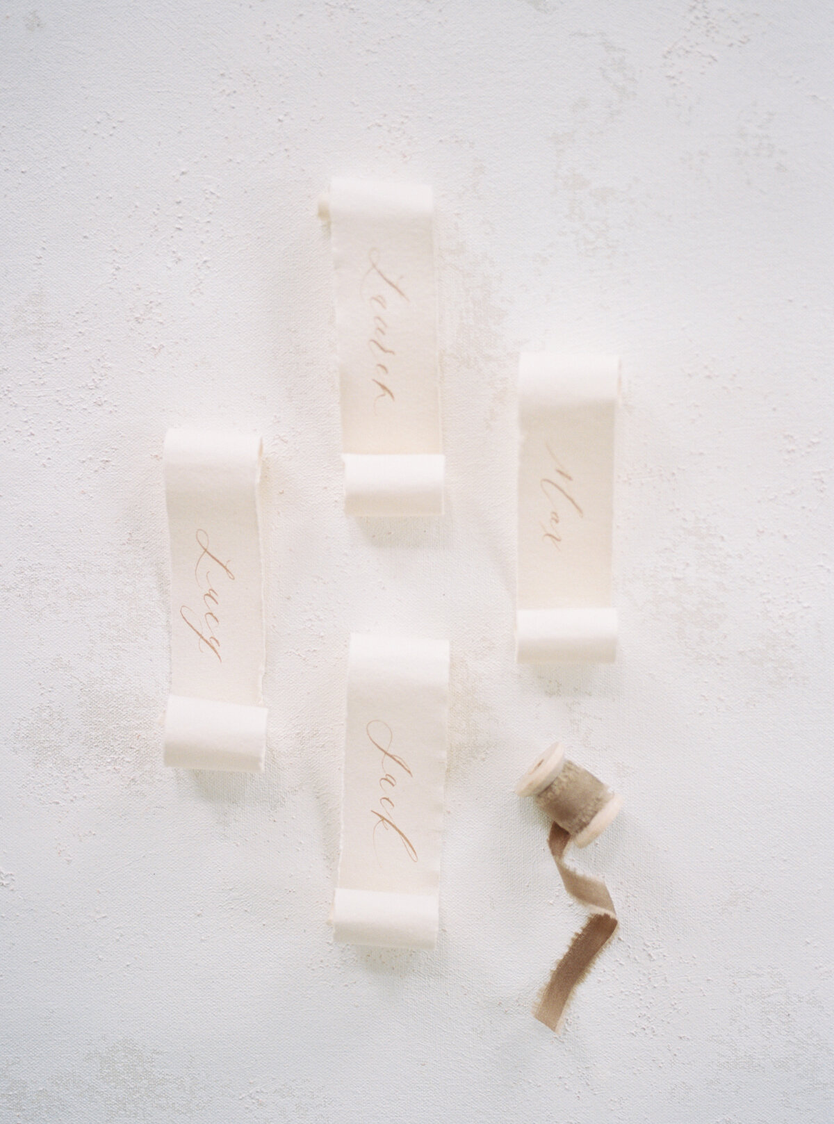 Hand calligraphy ivory scroll place cards