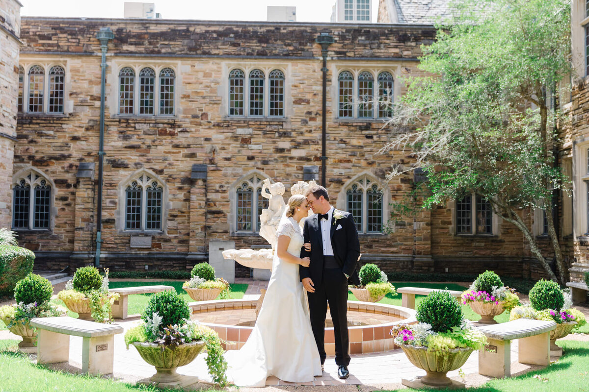 couple-posing-in-courtyard