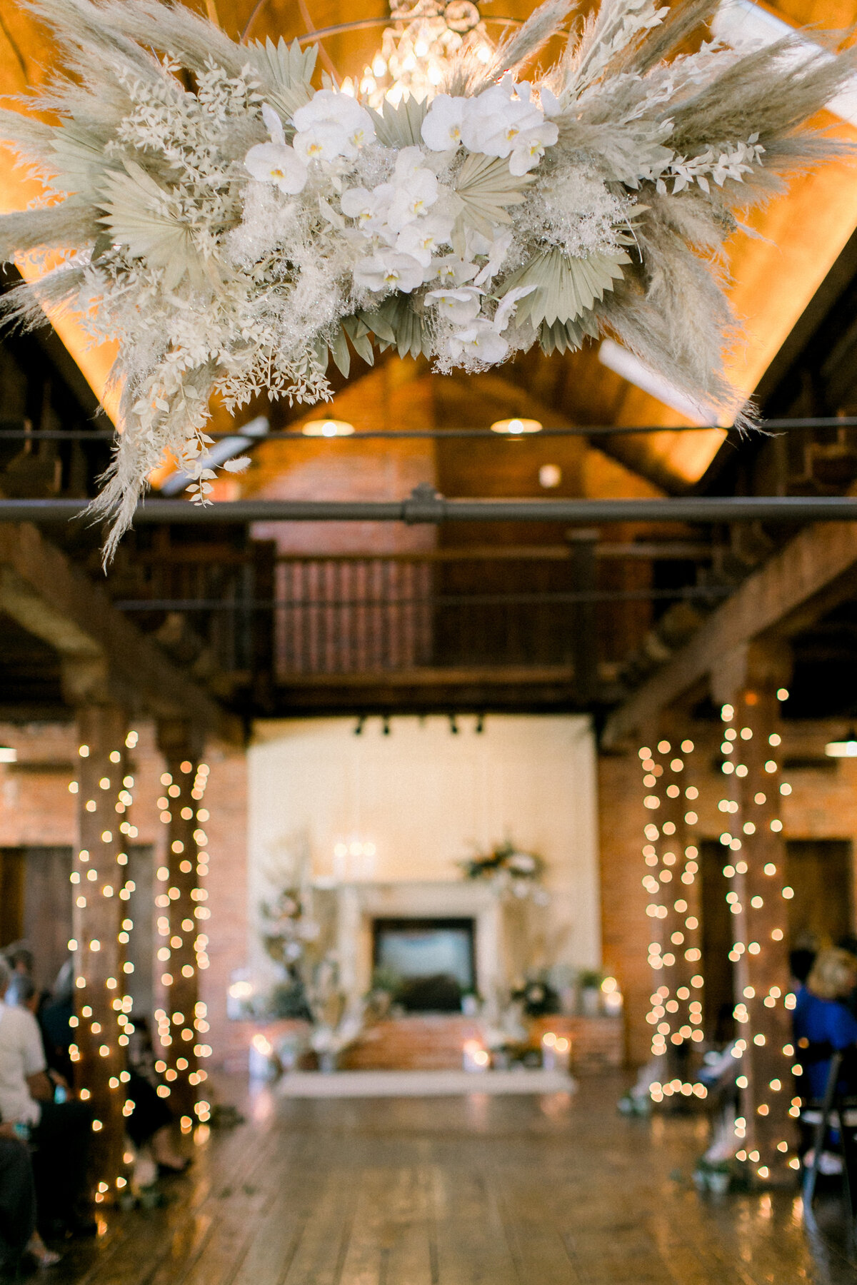 Love & Luster Floral Design Booking House protea toffee roses pampas grass boho wedding ceremony 5