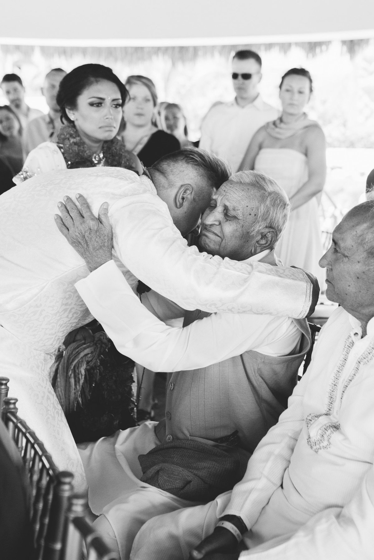 So much emotion for this family member who traveled from India to celebrate with them.  Rebecca Cerasani Destination Wedding photographer.