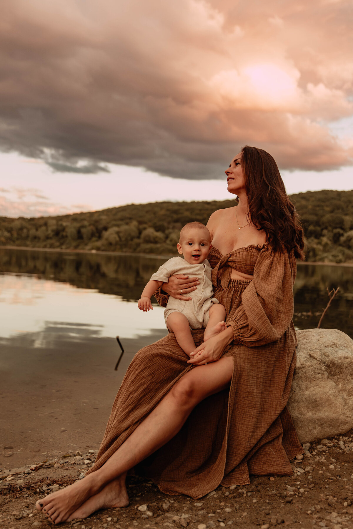 A mother and baby posing for a photo at a lake in Northern New Jersey