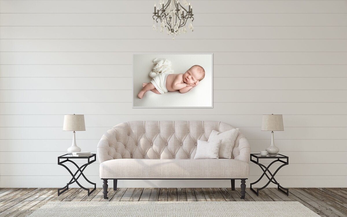 Newborn photo wall art in modern Houston farmhouse interior by Lissette G.