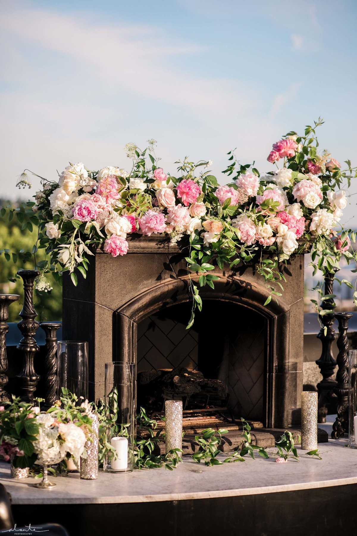 Hotel Ballard has a stunning rooftop fireplace we decorated with a huge peony floral instillation.