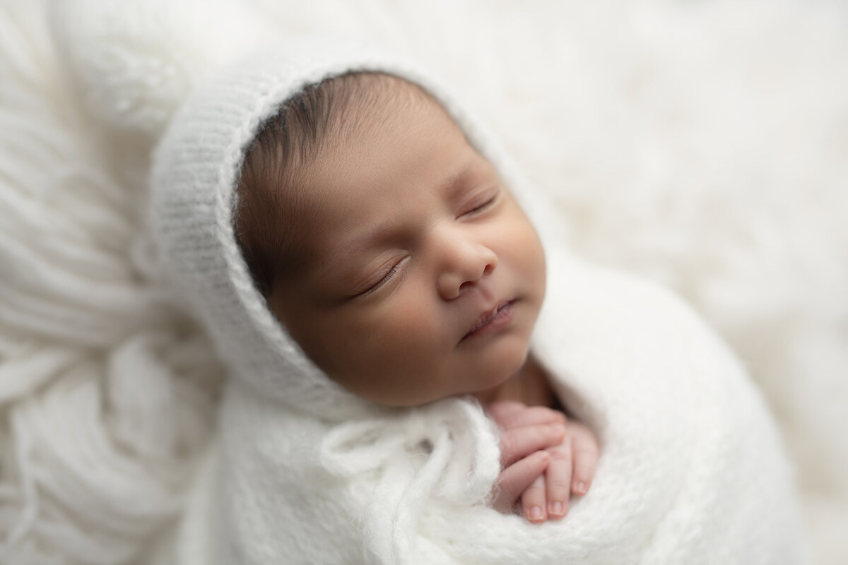 sweet baby girl in our newborn studio for a newborn and family session.brantford-ontario-luxury-newborn-photography-and-studio-in-paris-ontario