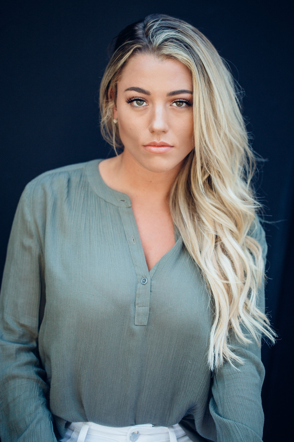 Headshot Photograph Of Young Woman In Gray Long Sleeves Los Angeles