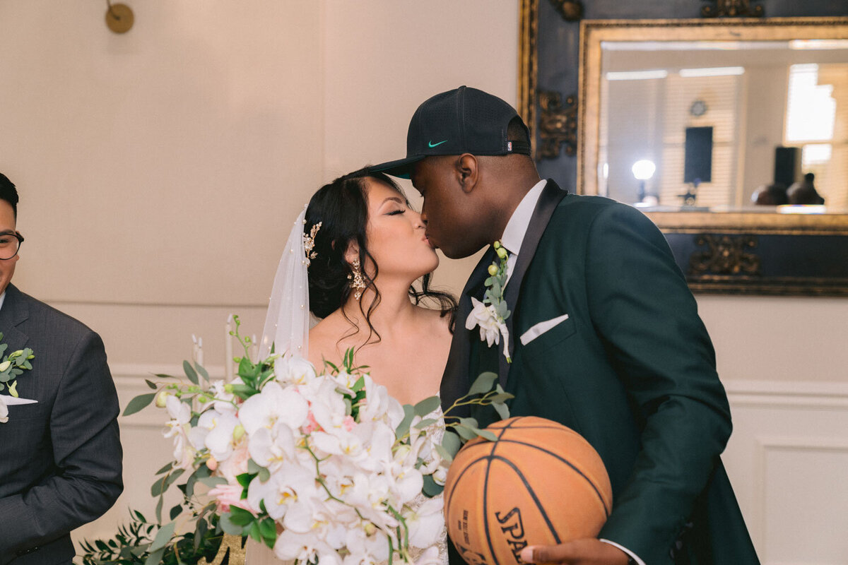 Bride and groom kissing