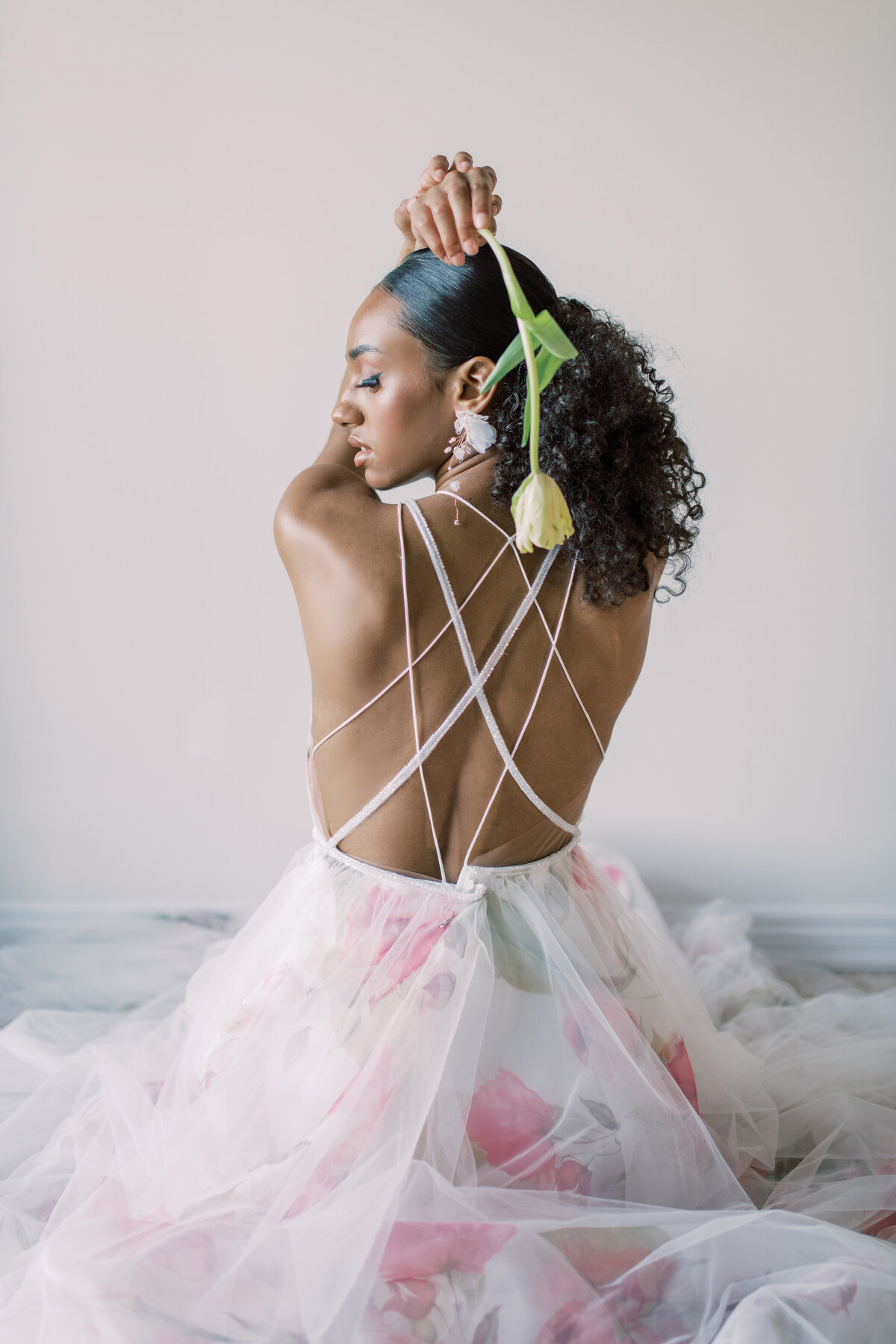 A bride’s delicate profile captured in soft, natural light, her elegance highlighted by Christine Grace Photography in Toronto