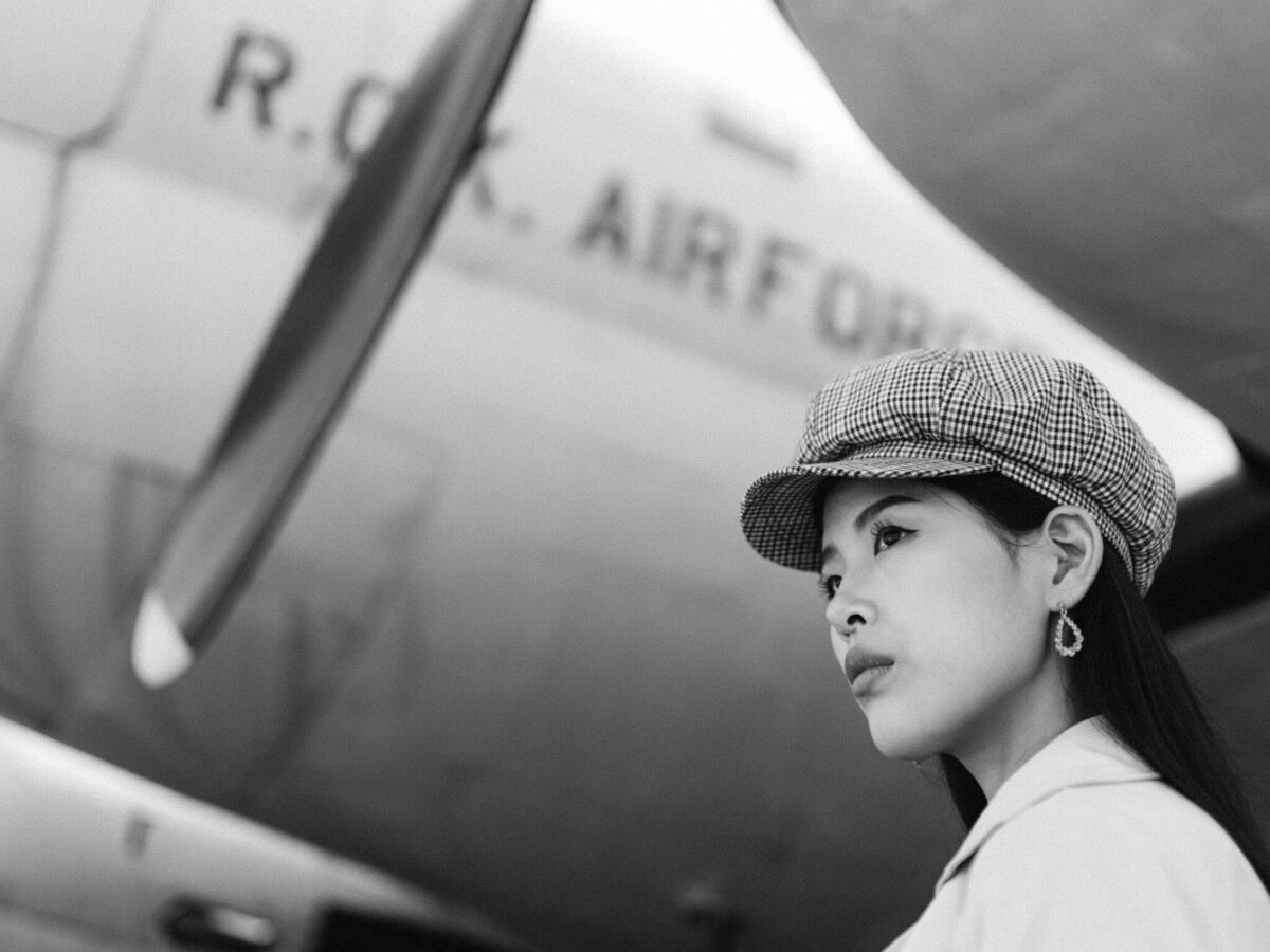 A striking editorial shoot at the War Memorial of Korea in Seoul, where historic American and Republic of Korea military aircraft set the stage for high-fashion storytelling. Captured in preparation for Seoul Fashion Week, this editorial blends luxury destination travel with the bold, architectural beauty of Seoul. Photographed by Michael Asmussen Photography, known for top-tier editorial and brand collaborations worldwide. Elevate your brand with refined imagery that tells a story of elegance, history, and modernity in South Korea’s dynamic capital." "서울 패션 위크를 위한 특별한 에디토리얼 촬영 – 대한민국 전쟁기념관에서 미군 및 대한민국 공군 항공기들과 함께한 독창적인 패션 스토리. 서울의 세련된 여행지와 역사적 아름다움을 담아낸 럭셔리 에디토리얼 촬영. 글로벌 브랜드와 협업하는 마이클 애스무센 포토그래피의 감각적인 작품을 만나보세요."