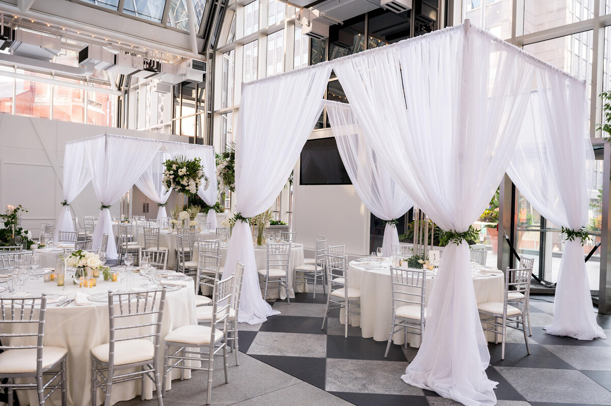 pittsburgh wedding venue wintergarden ppg place setup for a reception event with design by day of pgh planners