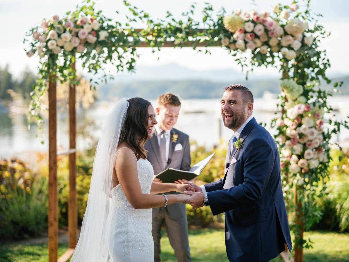 Alderbrooke Resort waterfront ceremony arbor in blush and white