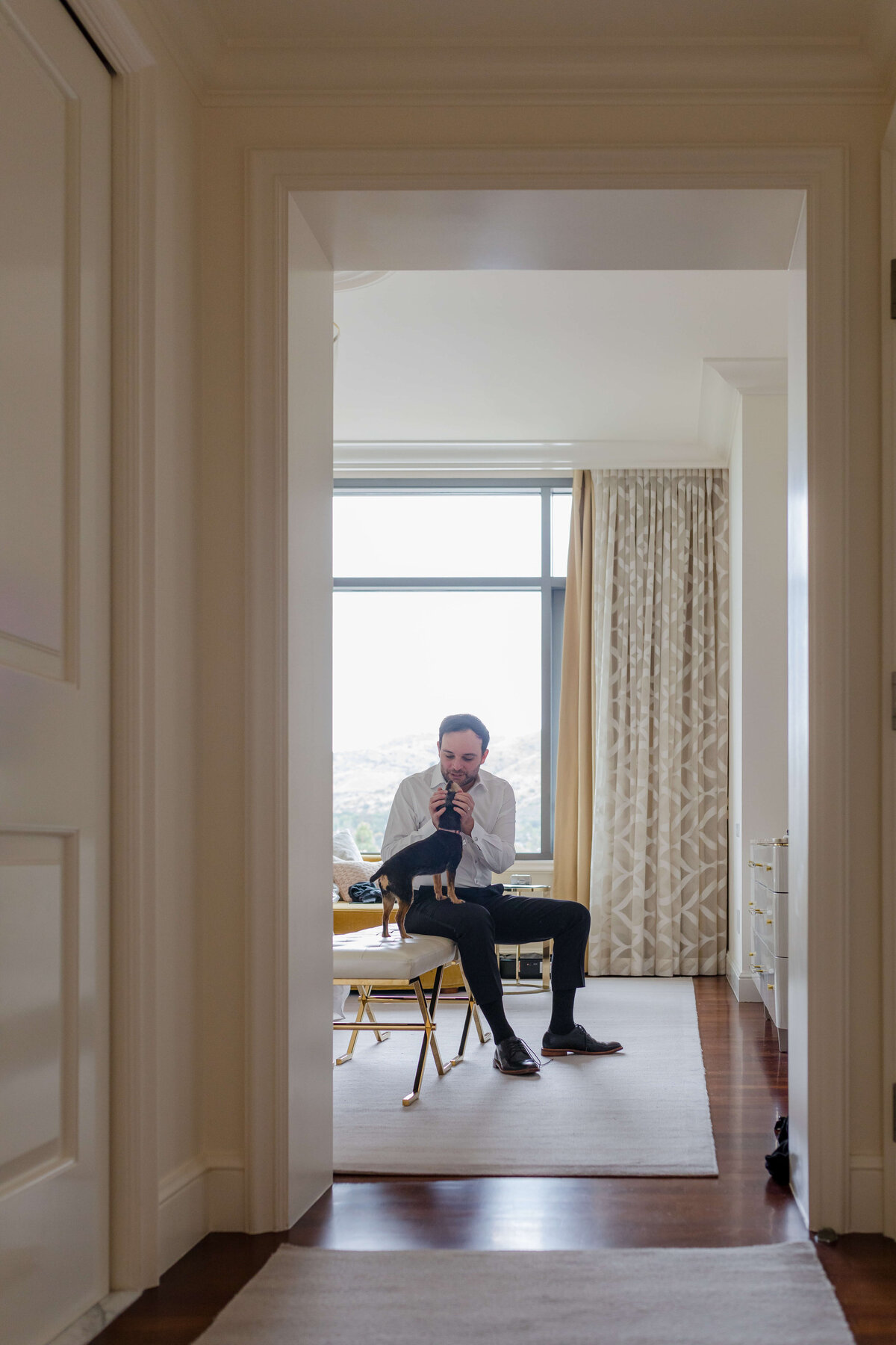 Groom getting ready at a hotel in Downtown LA