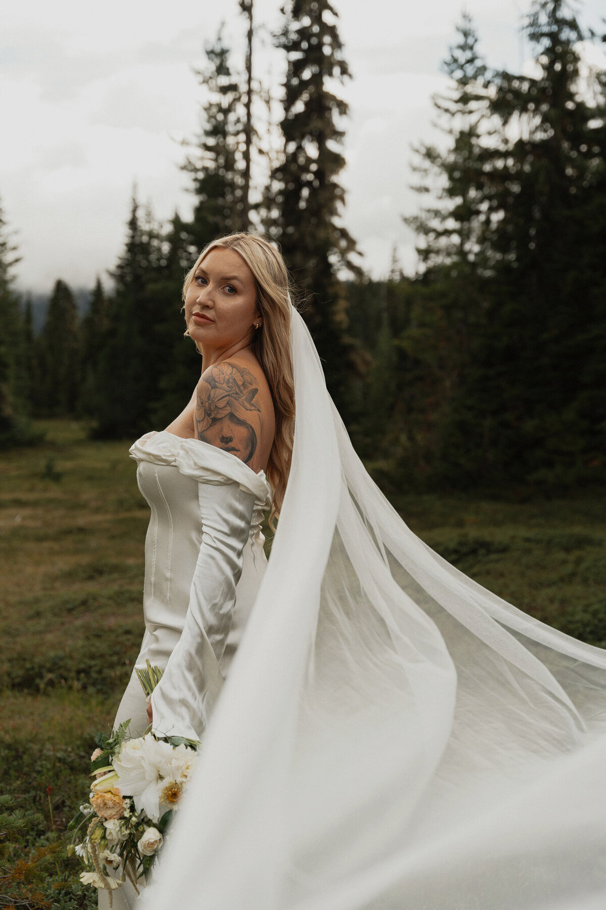Bride during her mount washington alpine resort elopement by latitude 49 photography