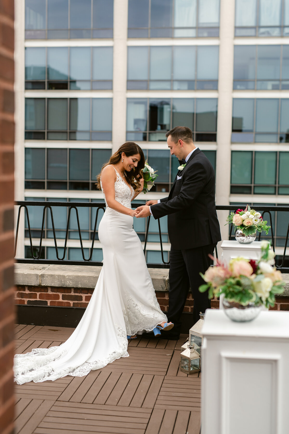 Bride and Groom share first look on top of Ambassador Hotel, in Chicago.