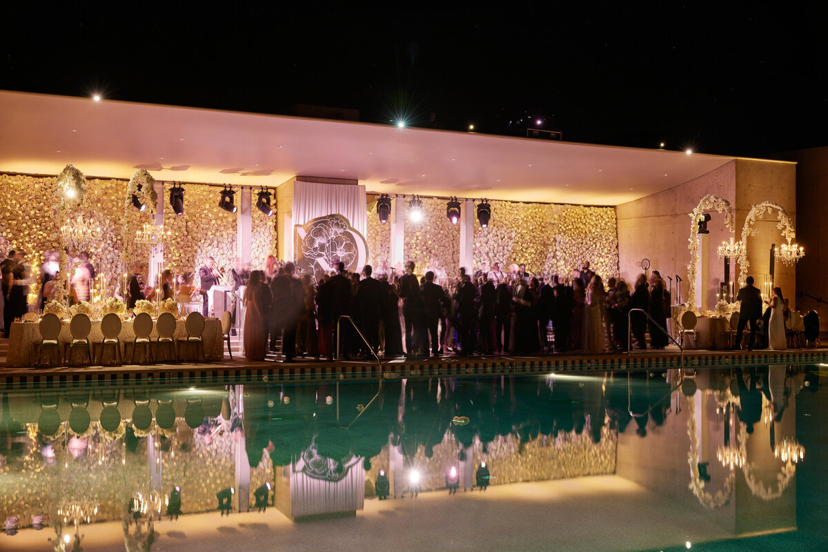 Reception seen from across a pool at Amangiri Utah