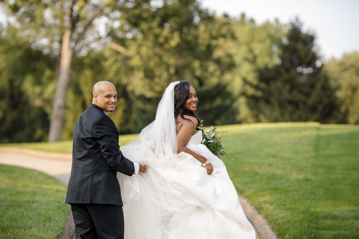 black bridal couple poses