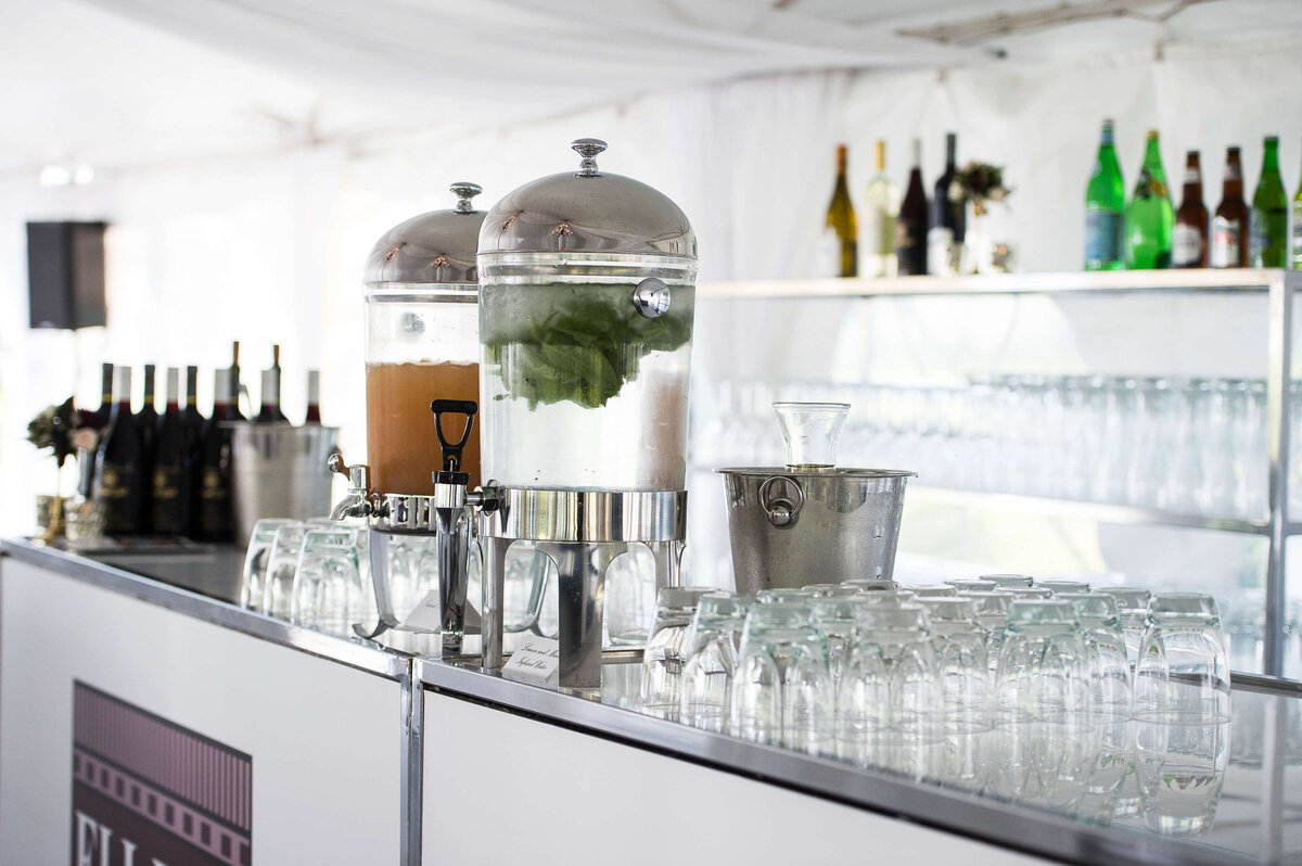 Ottawa event photography of the caterer's elegant water station with lime and lemon.  Captured by JEMMAN Photography COMMERCIAL