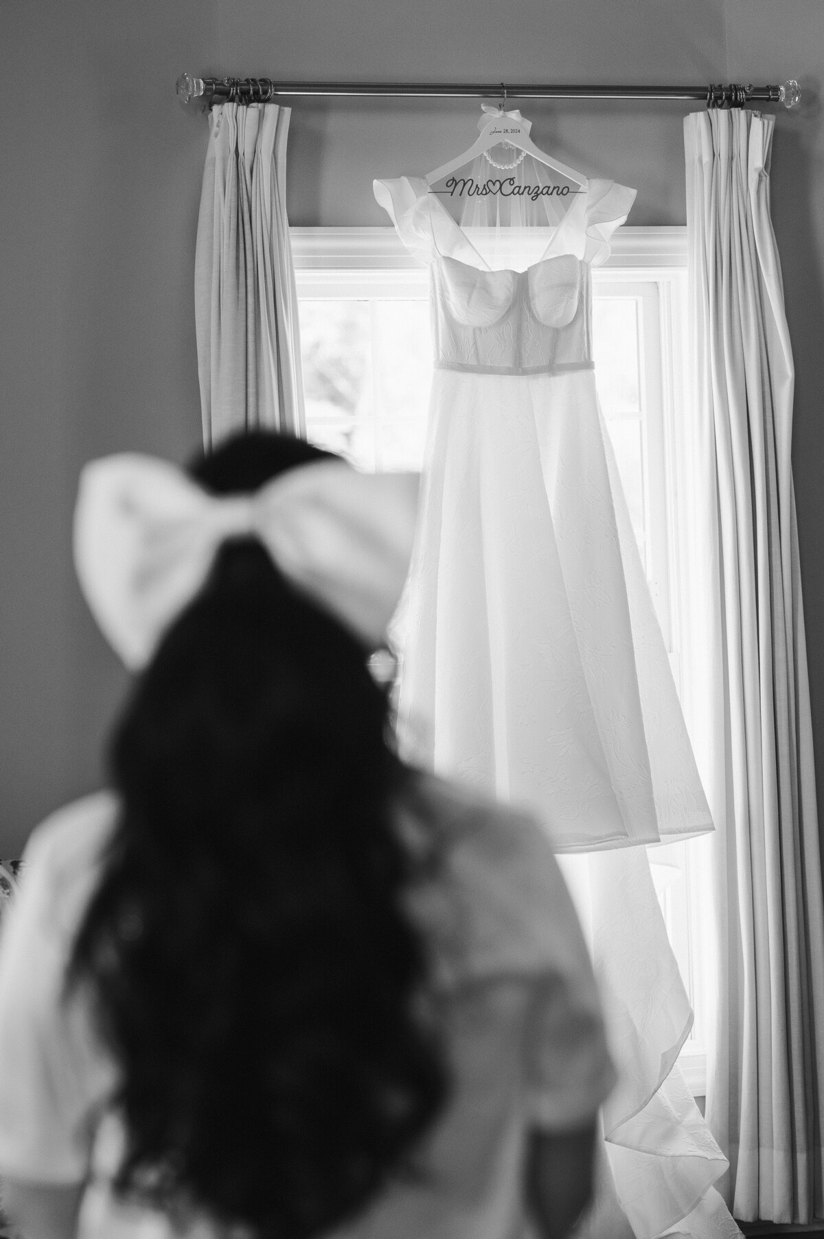 Bridal portrait wearing bow in hair