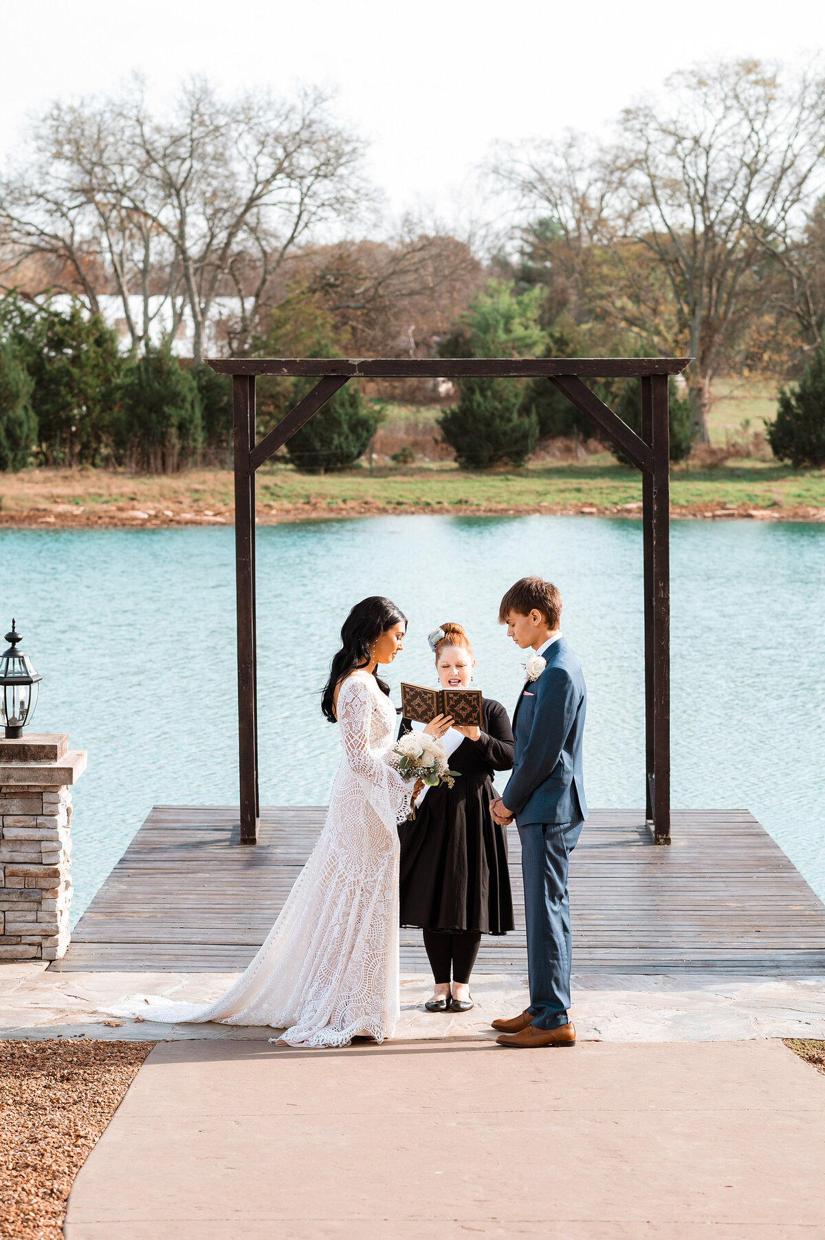 Couple holding hands during their elopement vows