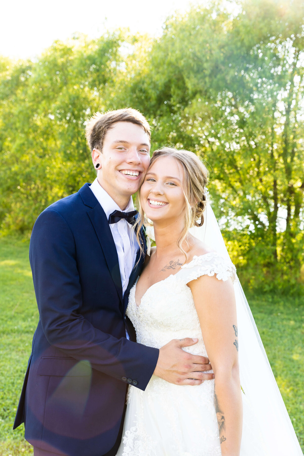Bride and groom portraits in the grounds of the Ruby Cora wedding venue in Clarksville, TN