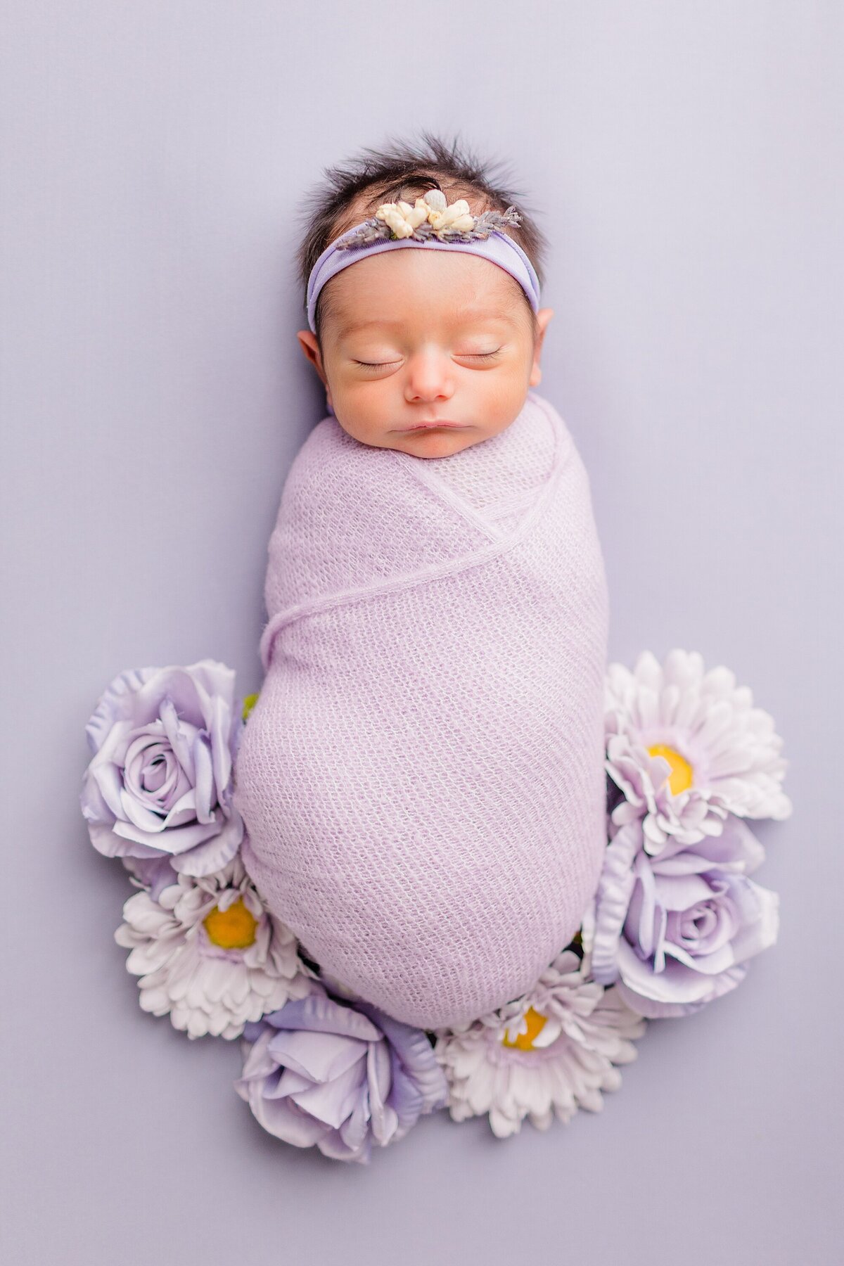 lavender newborn image with florals