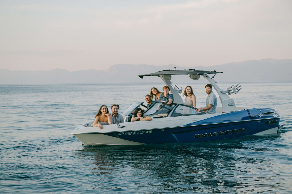 Lake Tahoe photographer capturing a family on a boat at sunset