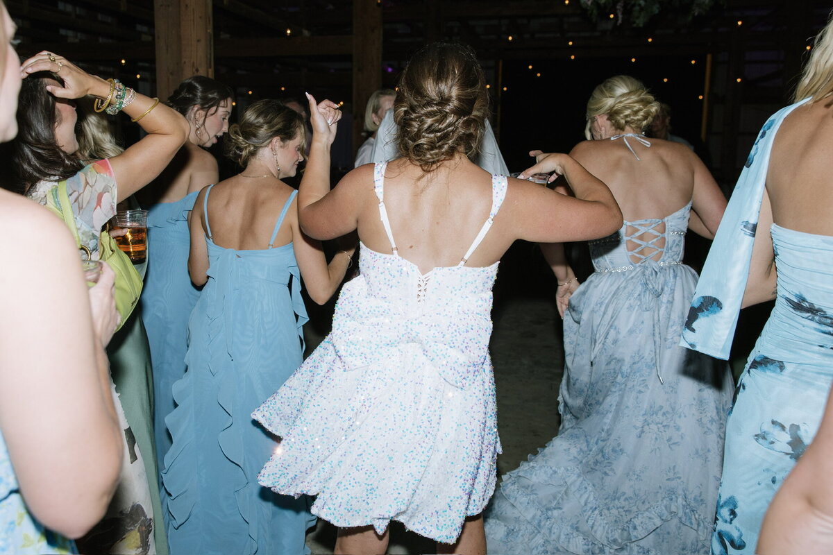 Danciing at reception with friends at Central Kentucky wedding venue Willstone Acres
