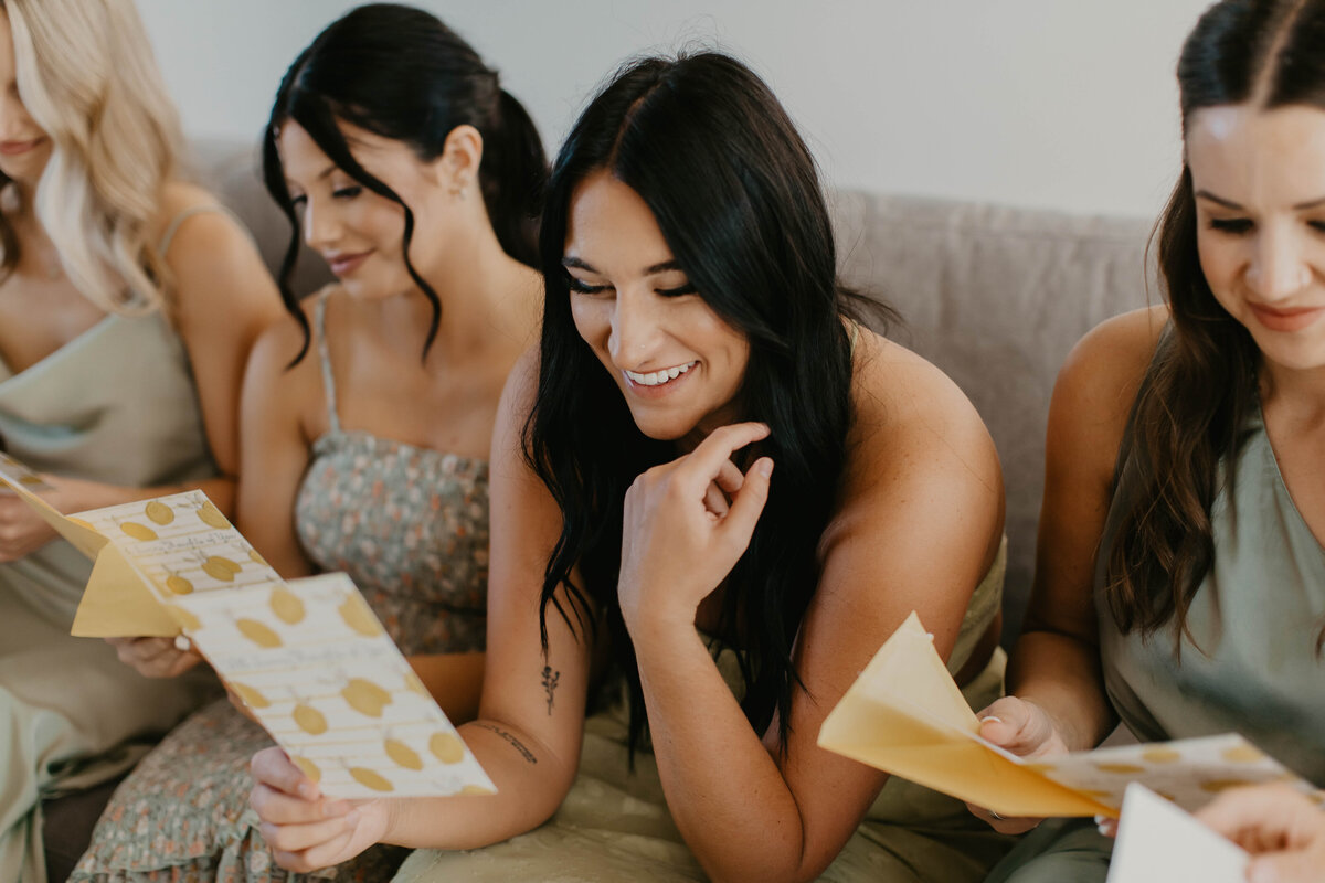 Bridesmaid opening gift from bride. 